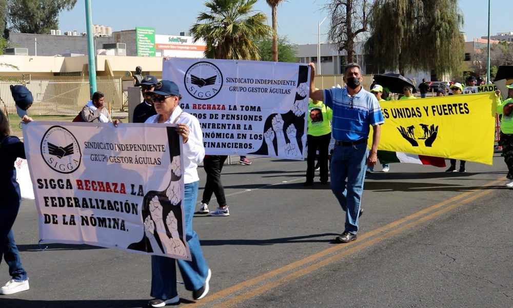 Trabajadores y colectivos alzan la voz en desfile del Día del Trabajo ...